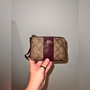 COACH CORNER ZIP WRISTLET IN SIGNATURE CANVAS